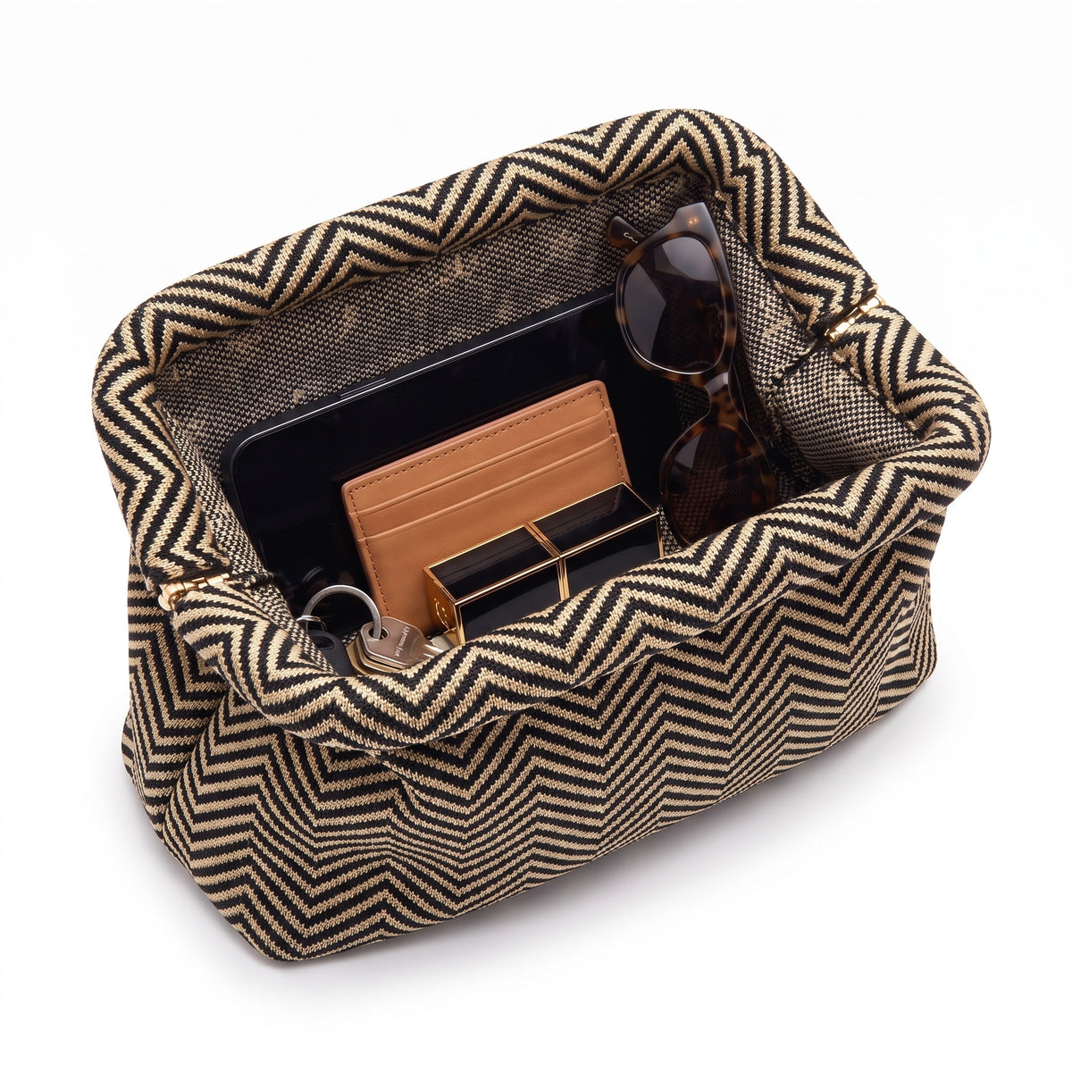 Olive Chevron Cloud Pouch shown open with everyday items inside