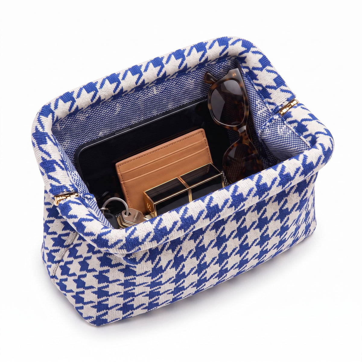 Cobalt Houndstooth Cloud Pouch shown open with everyday items inside