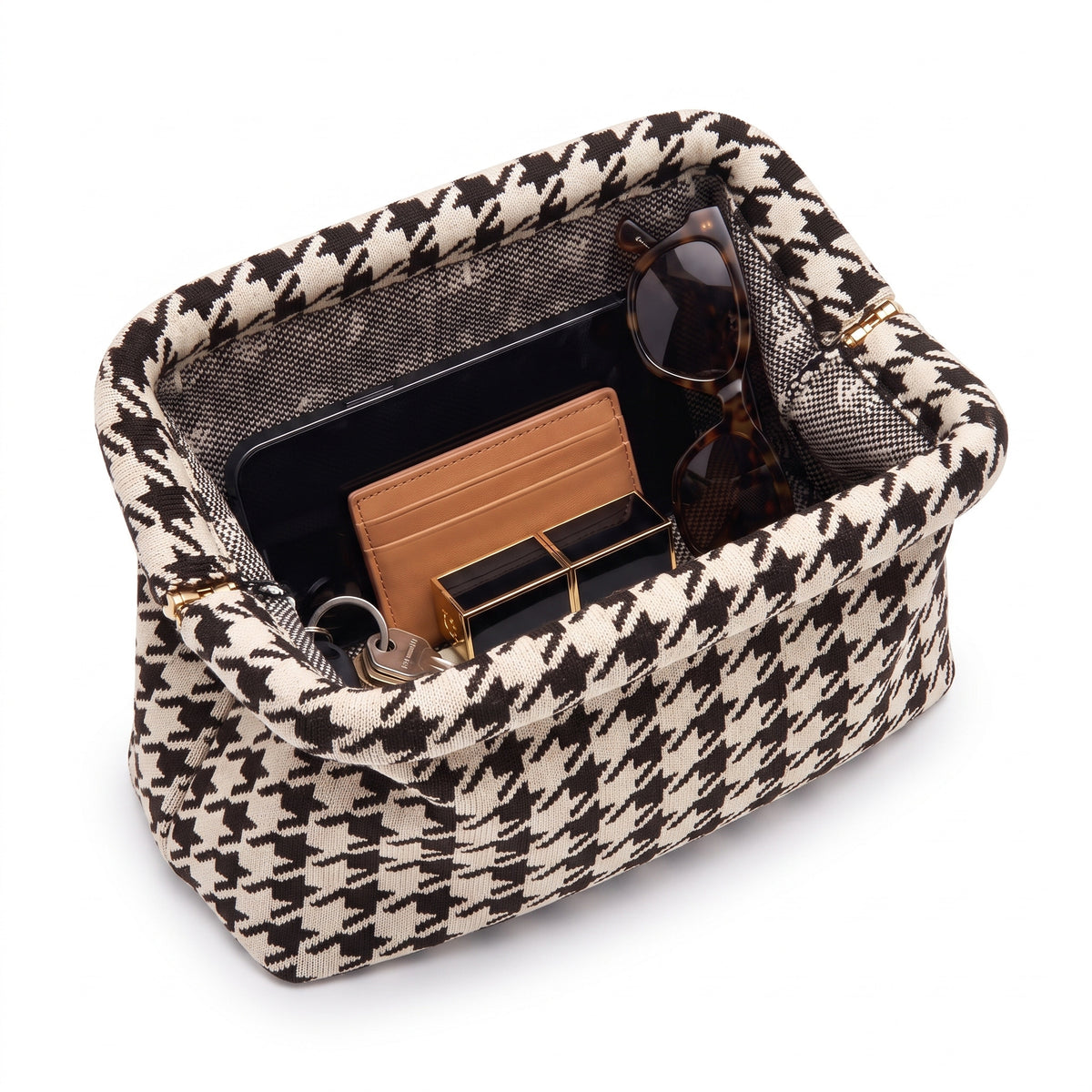 Monochrome Houndstooth Cloud Pouch shown open with everyday items inside