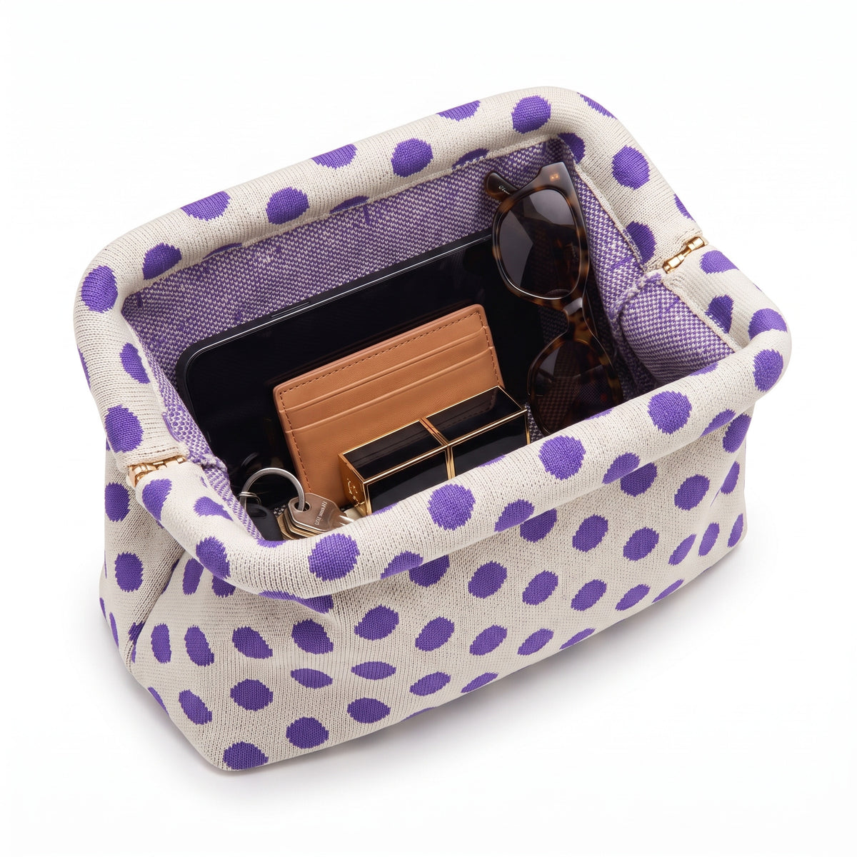 Lilac Polka Dot Cloud Pouch open — flex frame, mesh lining, fits phone, wallet, keys