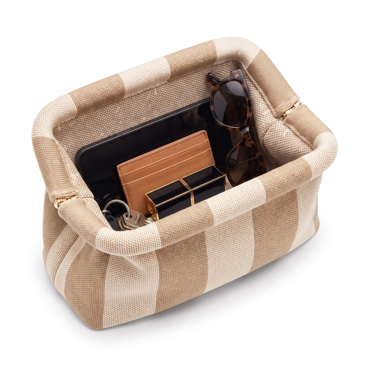 Oat Tonal Stripe Cloud Pouch shown open with everyday items inside