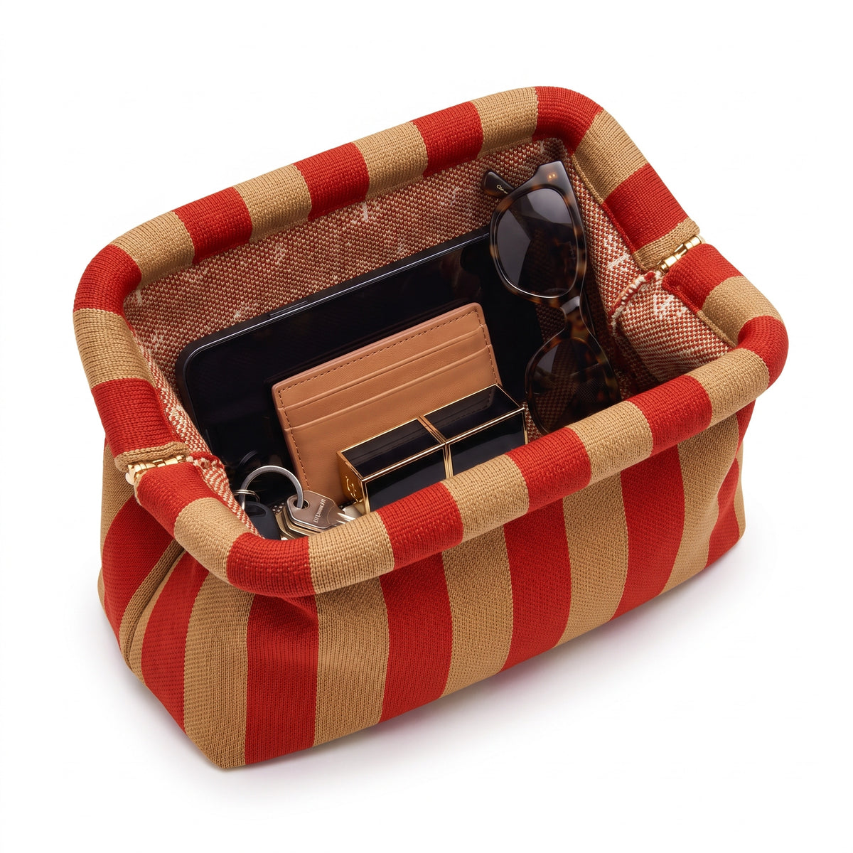 Poppy & Tan Pinstripe Cloud Pouch shown open with everyday items inside