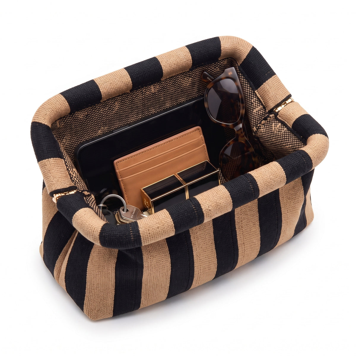 Camel & Black Stripe Cloud Pouch open — flex frame, mesh lining, fits phone, wallet, keys