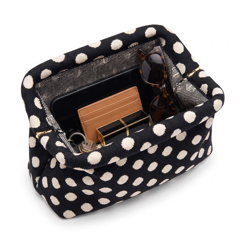Black Polka Dot Cloud Clutch open — flex frame, mesh lining, fits phone, wallet, keys