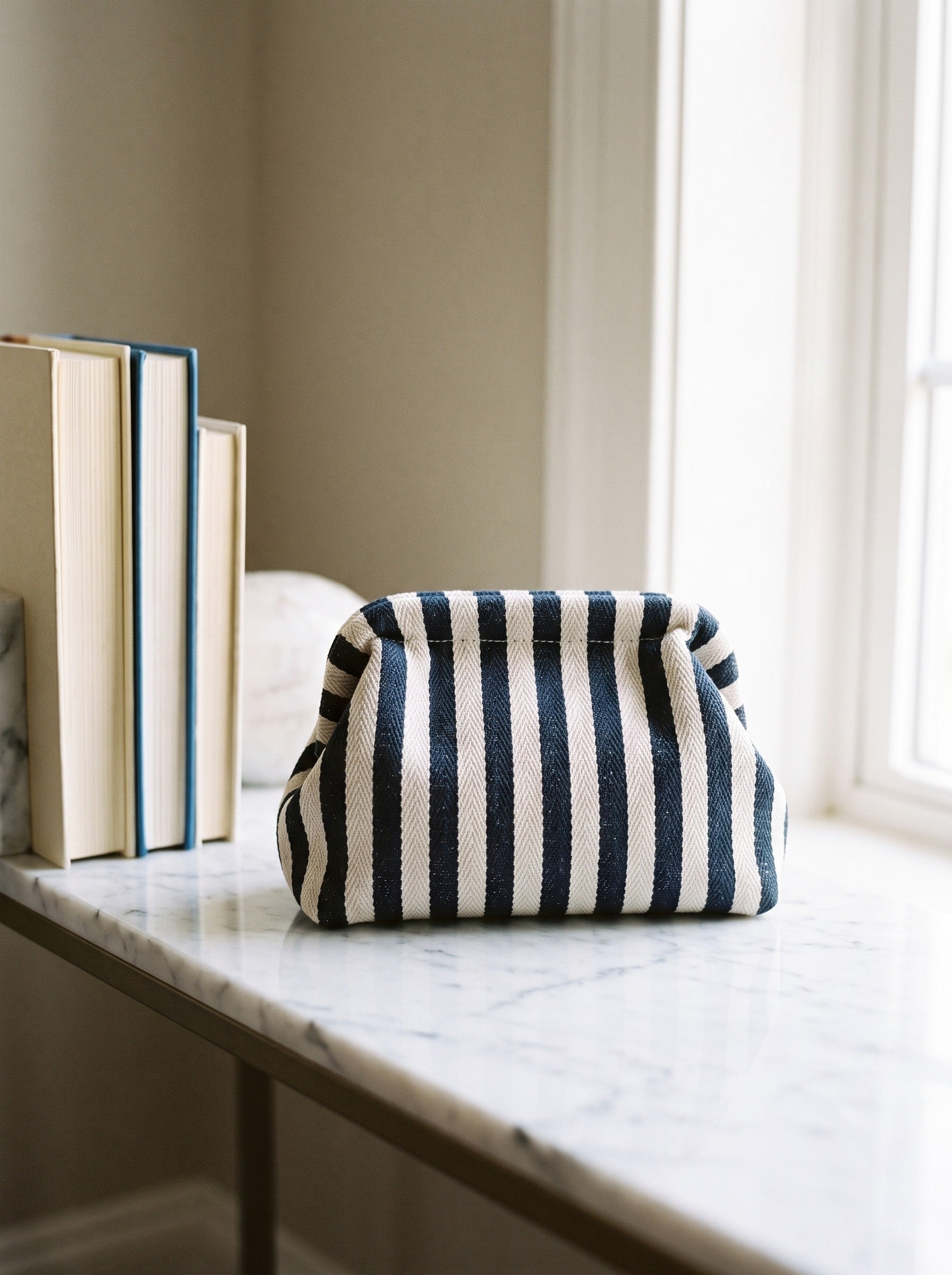 Navy & Cream Stripe Cloud Pouch — lifestyle