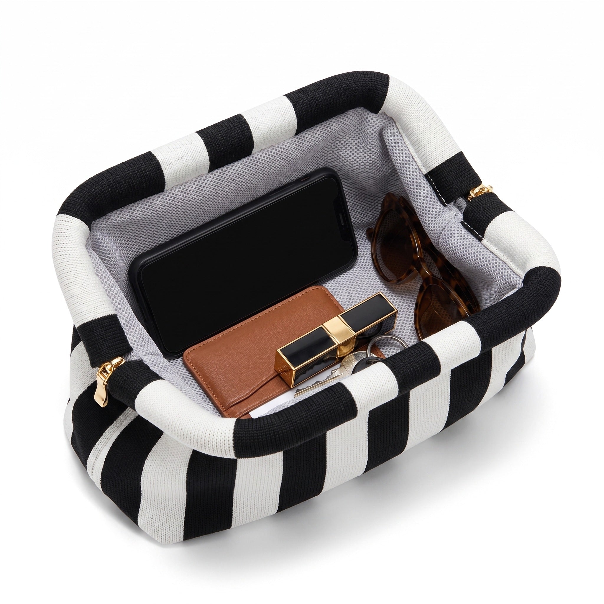 Monochrome Stripe Cloud Clutch open — flex frame, mesh lining, fits phone, wallet, keys