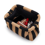 Camel & Black Stripe Cloud Clutch open — flex frame, mesh lining, fits phone, wallet, keys
