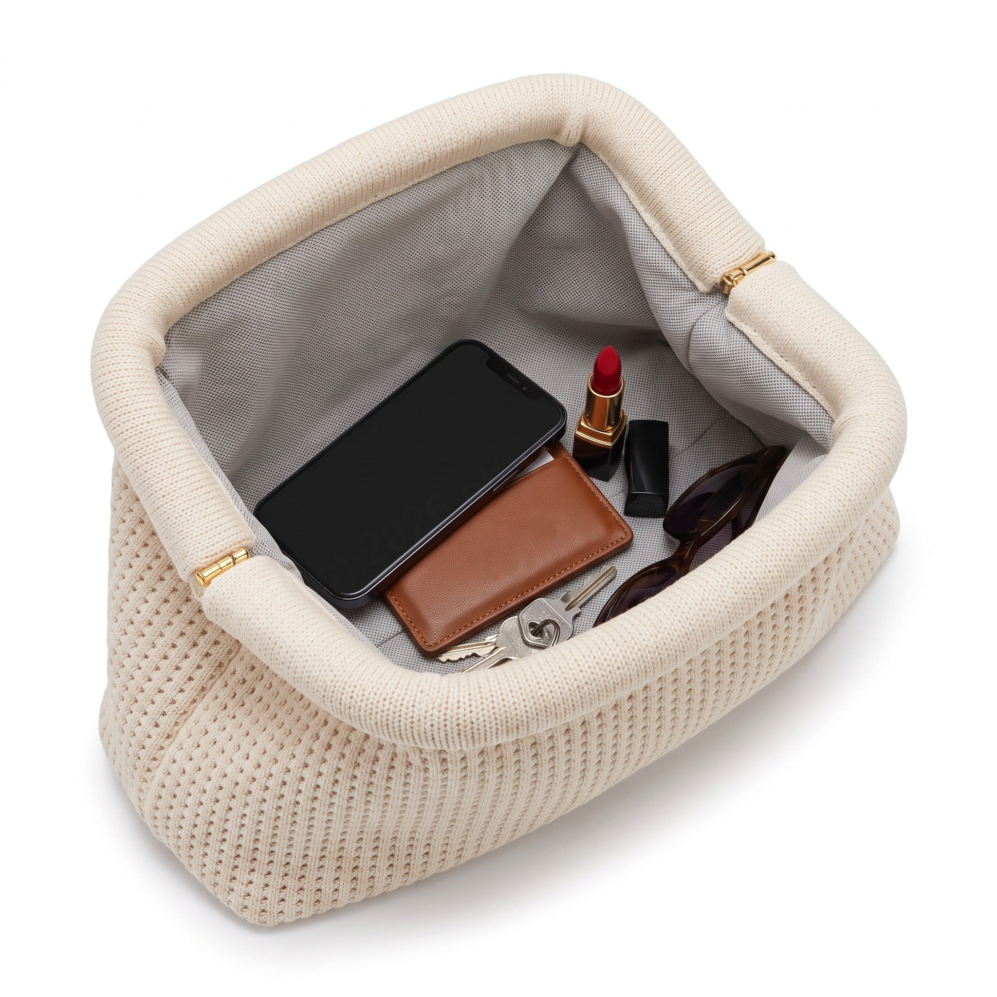 Cream Waffle Cloud Pouch open — flex frame, fits phone, wallet, keys