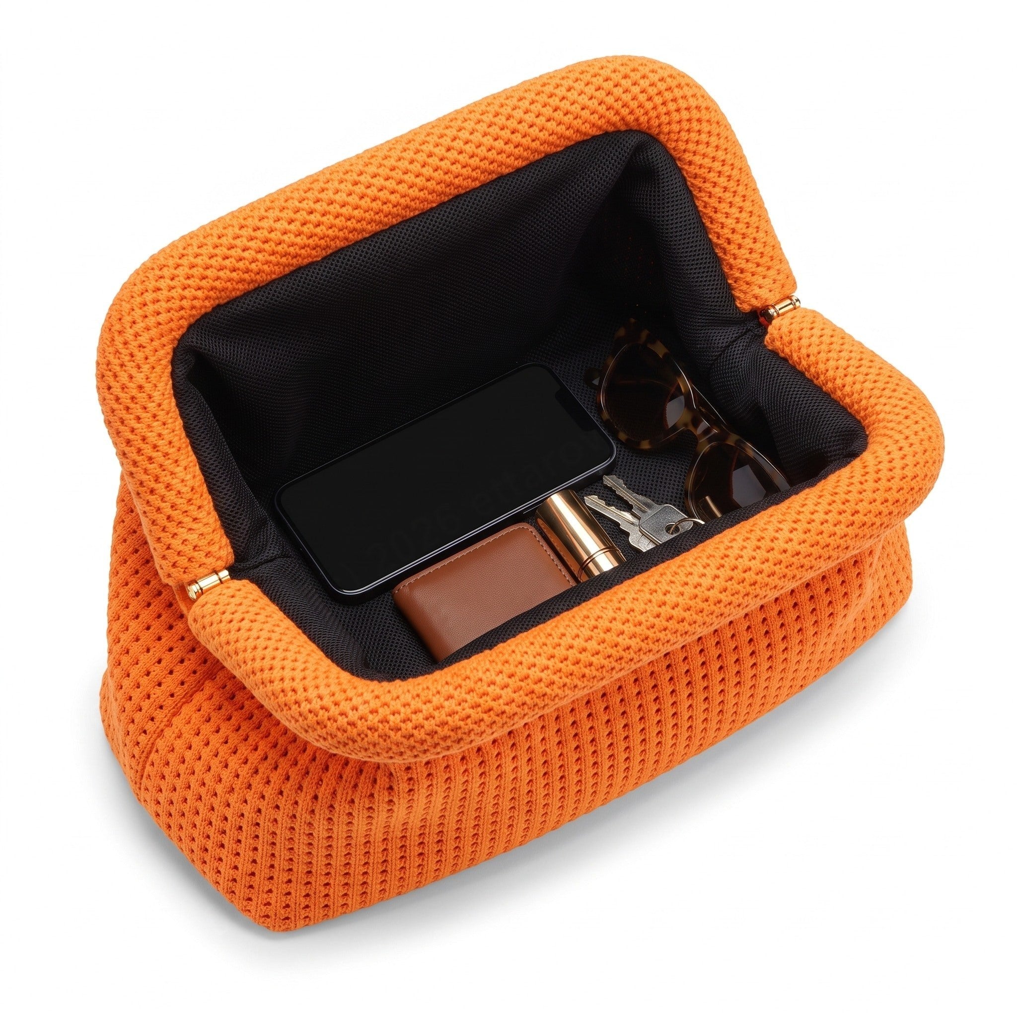 Tangerine Waffle Cloud Pouch open — flex frame, fits phone, wallet, keys